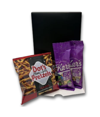 Conference Sweets & Snacks Trail Mix & Dot's Pretzels table unit with 9 bags of Kar's Sweet 'n Salty Trail Mix and 6 bags of Dot's Homestyle Pretzels.